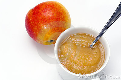 Apple Sauce With A Spoon In A