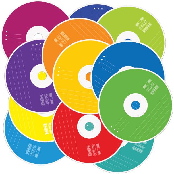 Heap of CDs or DVDs - CD pile with colored labels as a symbol for mass
