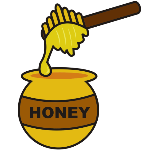 Honey with dipper pouring in 