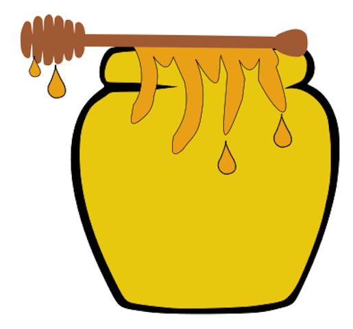 Honey with dipper pouring in 