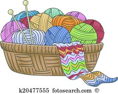 knitting needles in a ball of