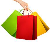 Shopping Bags; Female hand holding colorful shopping bags. Vector  illustration.