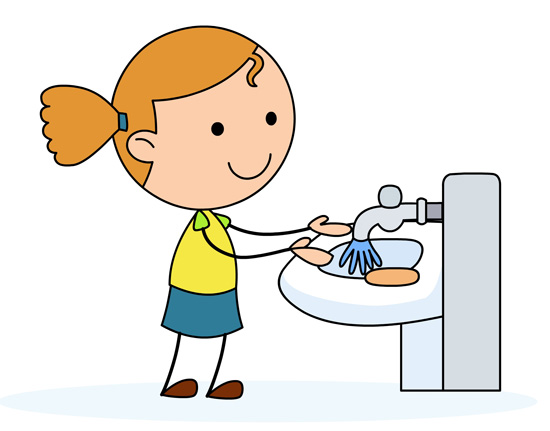 little girl washing hands .